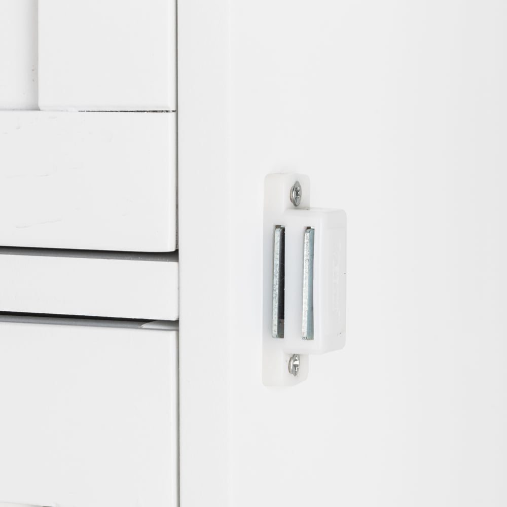 Magnetic catch detail on the cupboard door