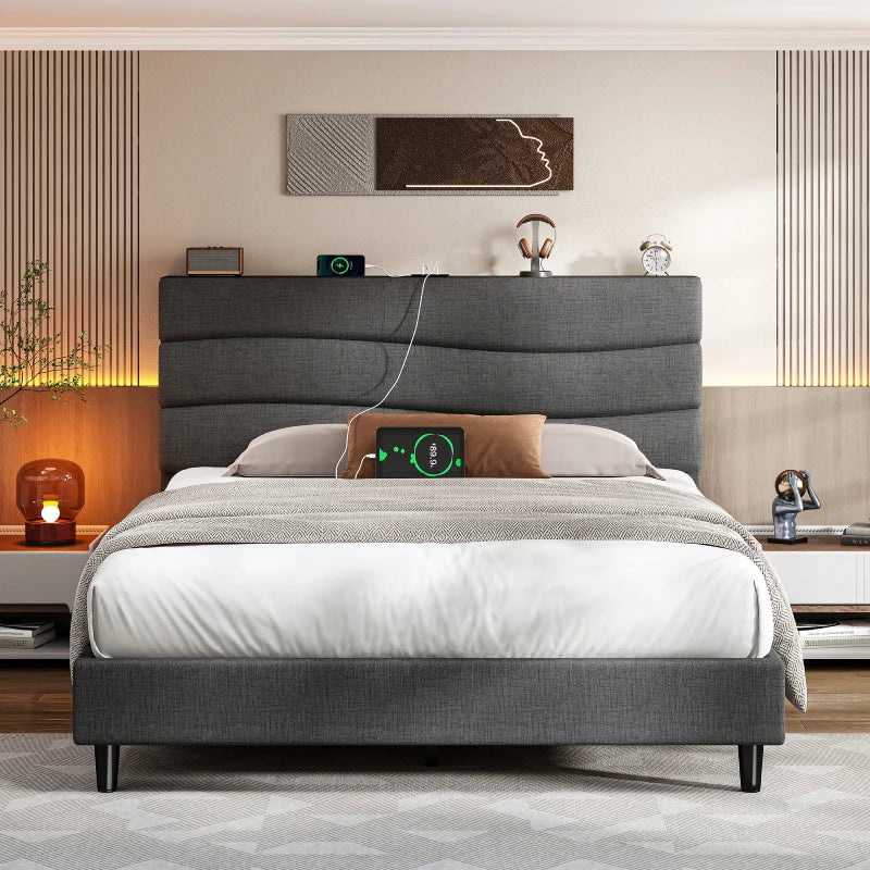 Front view of the grey wave stitched headboard with pillows in place