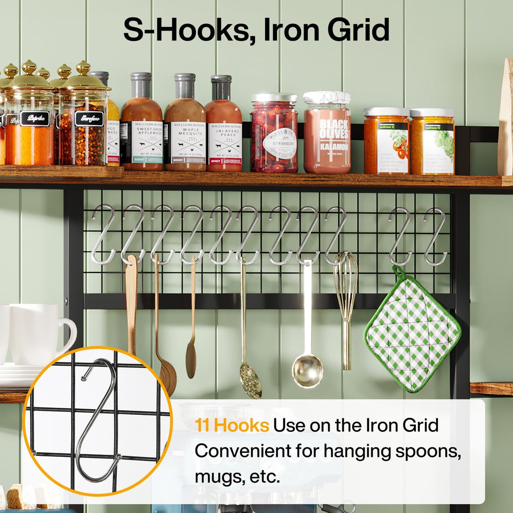Close view of the iron grid panel with eleven S hooks holding mugs and utensils
