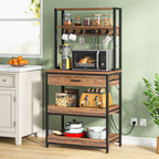 Stowena 5 tier bakers rack with power outlets holding a microwave and kitchen items beside a counter