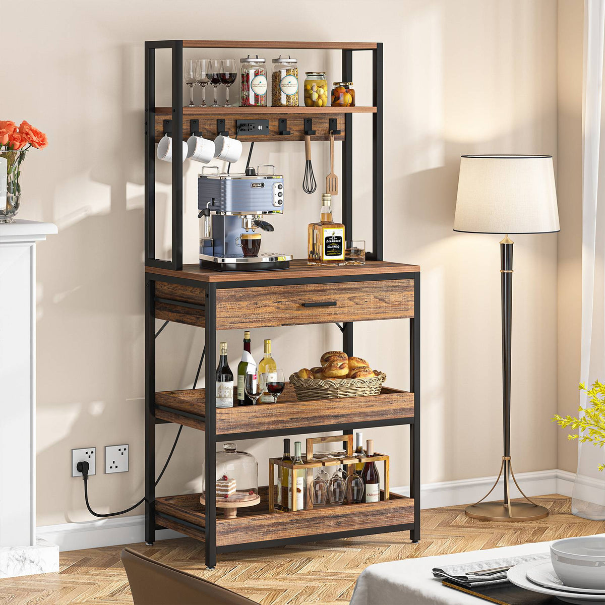 Bakers rack coffee bar with an espresso machine plugged into the built-in outlets