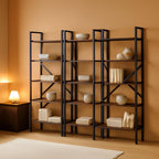 Stowena wide rustic brown bookshelf with 11 open shelves against a living room wall