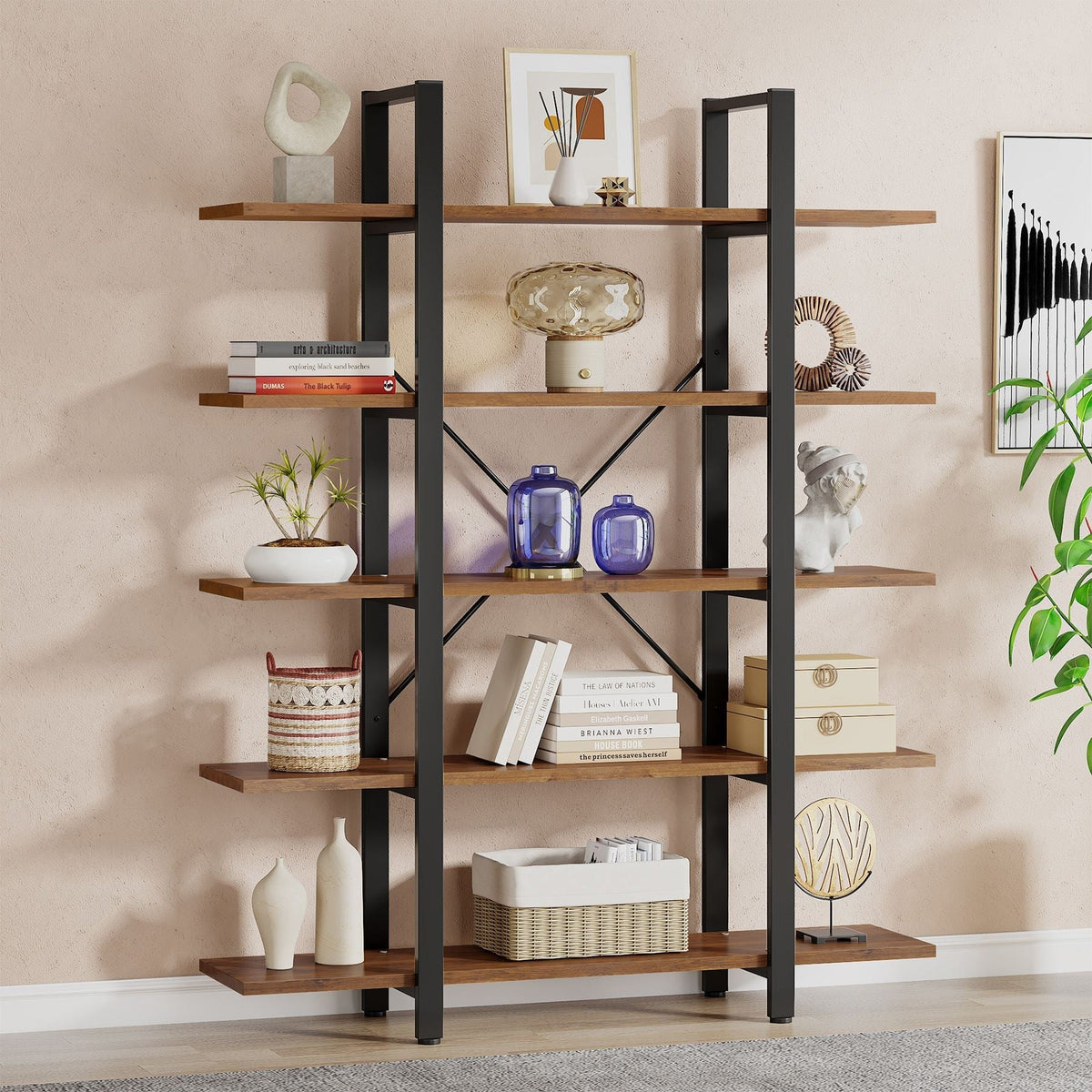 Open etagere bookcase holding books, frames and plants in a living room