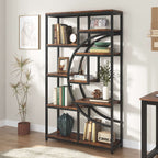 Etagere bookcase holding books, plants and decor against a pale wall