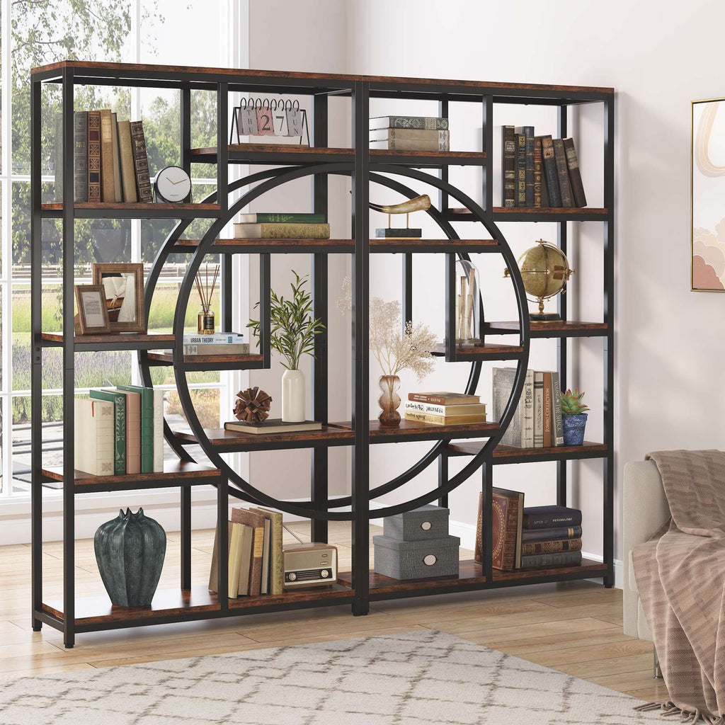Half moon etagere used as a room divider holding books and ornaments