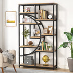 Rustic brown and black etagere styled with books, frames and a clock