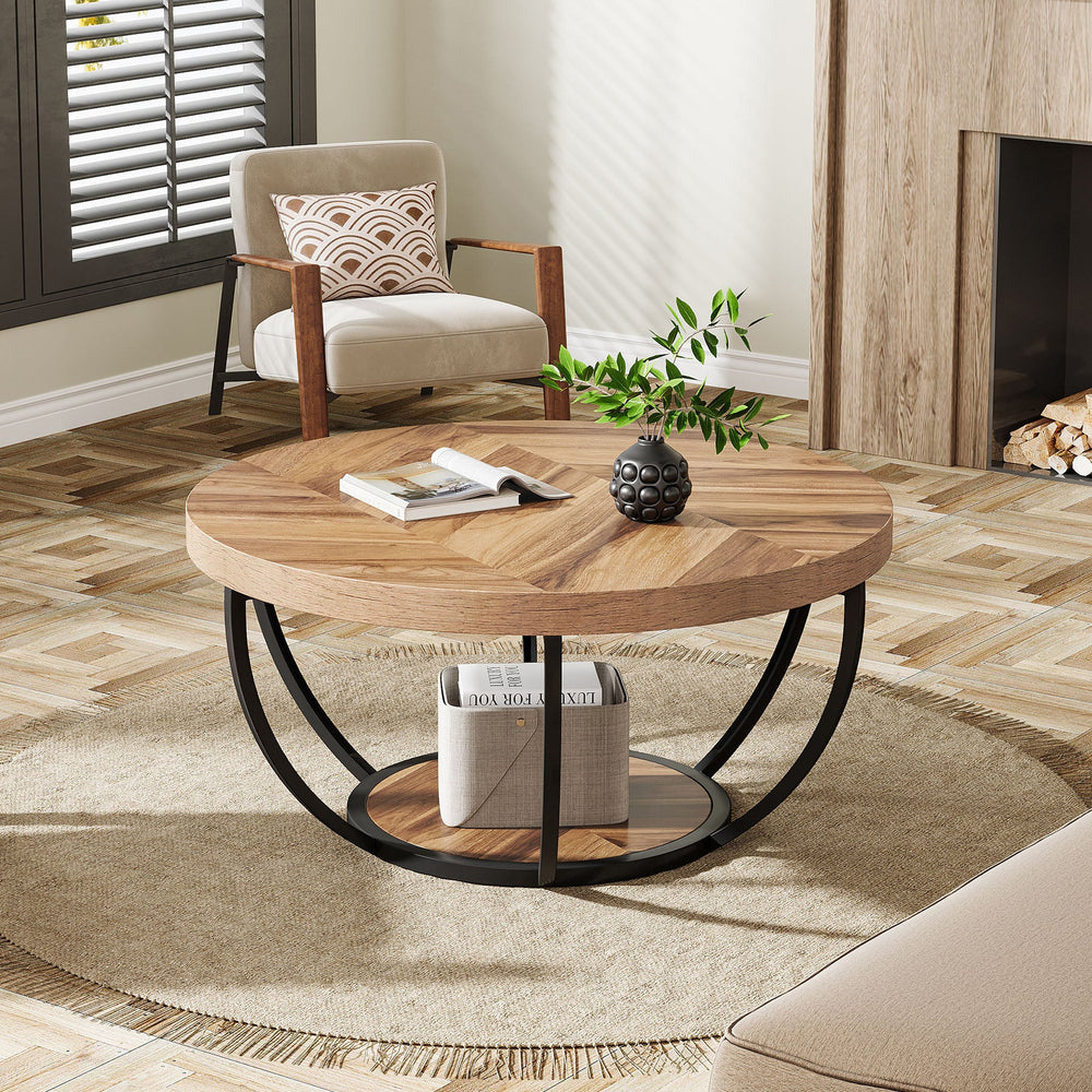 Round coffee table with curved steel legs on a rug in a bright living room