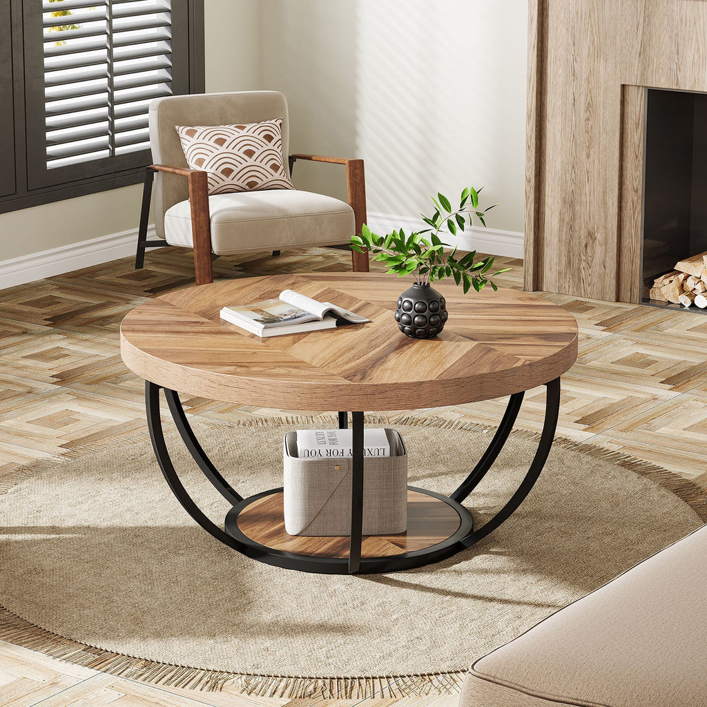 Round coffee table with curved steel legs on a rug in a bright living room