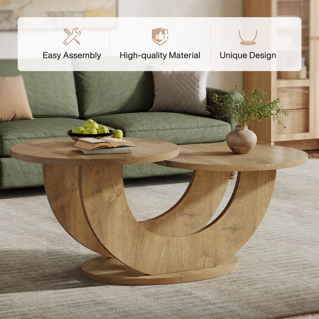 Oak coffee table with two round tops beside a green sofa