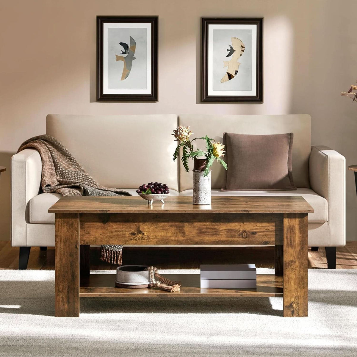 Rustic brown lift top coffee table closed in front of a beige sofa