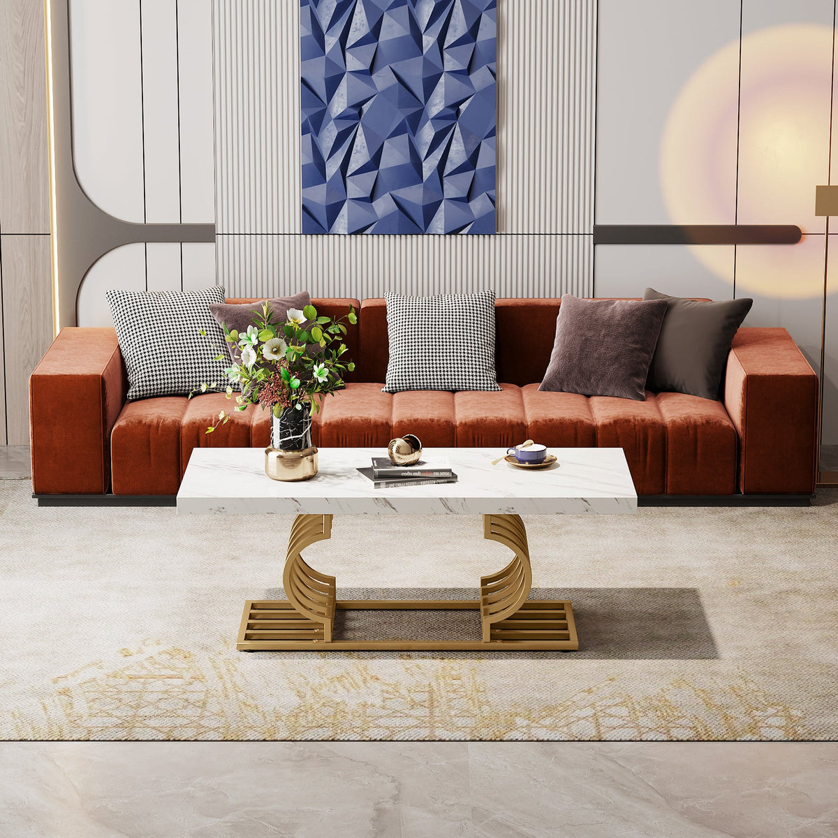 Faux marble cocktail table between an orange sofa and blue wall panels