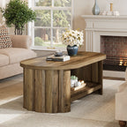 Fluted drum bases of the oval coffee table by a fireplace seating area
