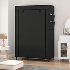 Black portable closet with the dust cover zipped shut in a bedroom, side pockets visible on the end panel