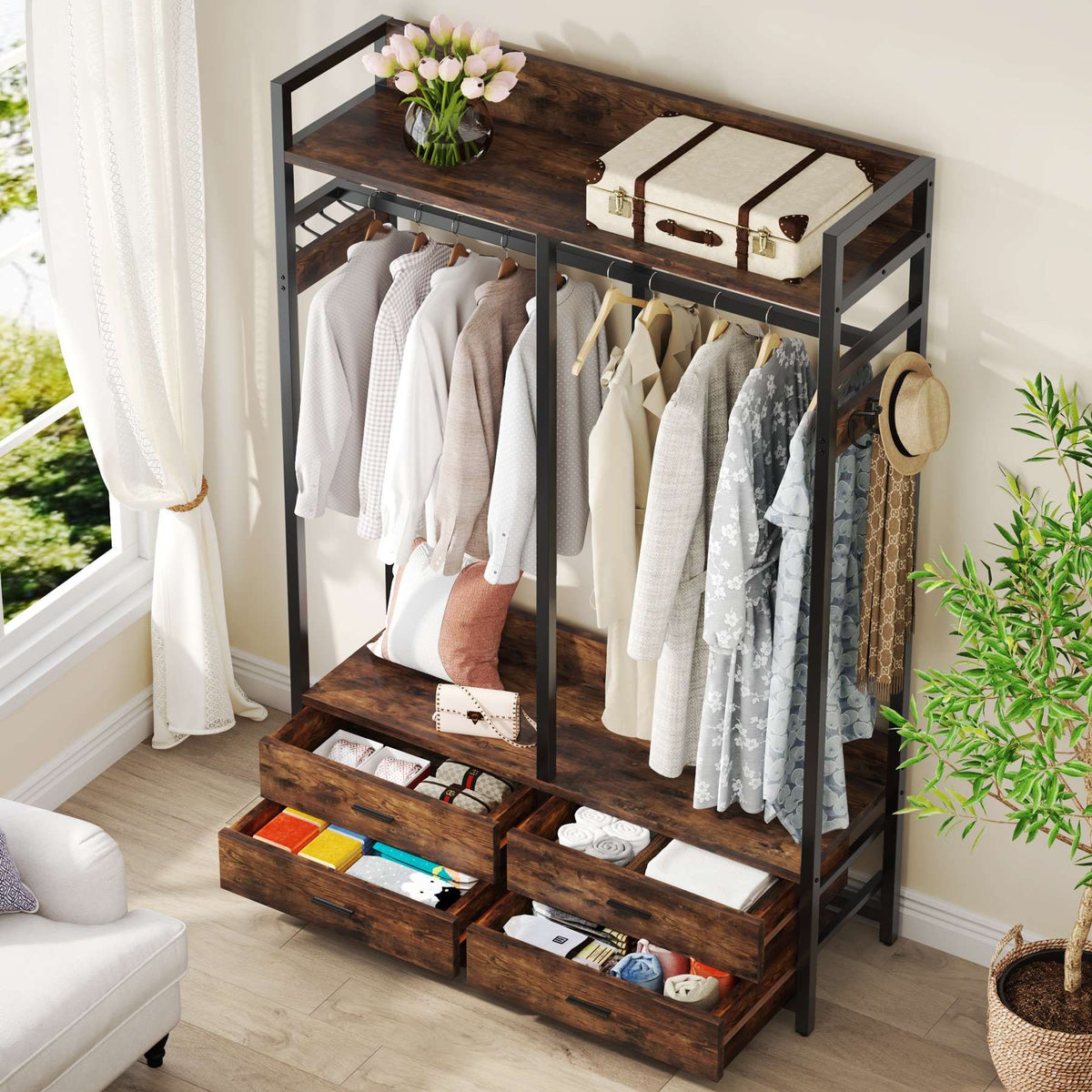 Closet organizer with two fabric drawers pulled open showing folded clothes and small items, hanging shirts above