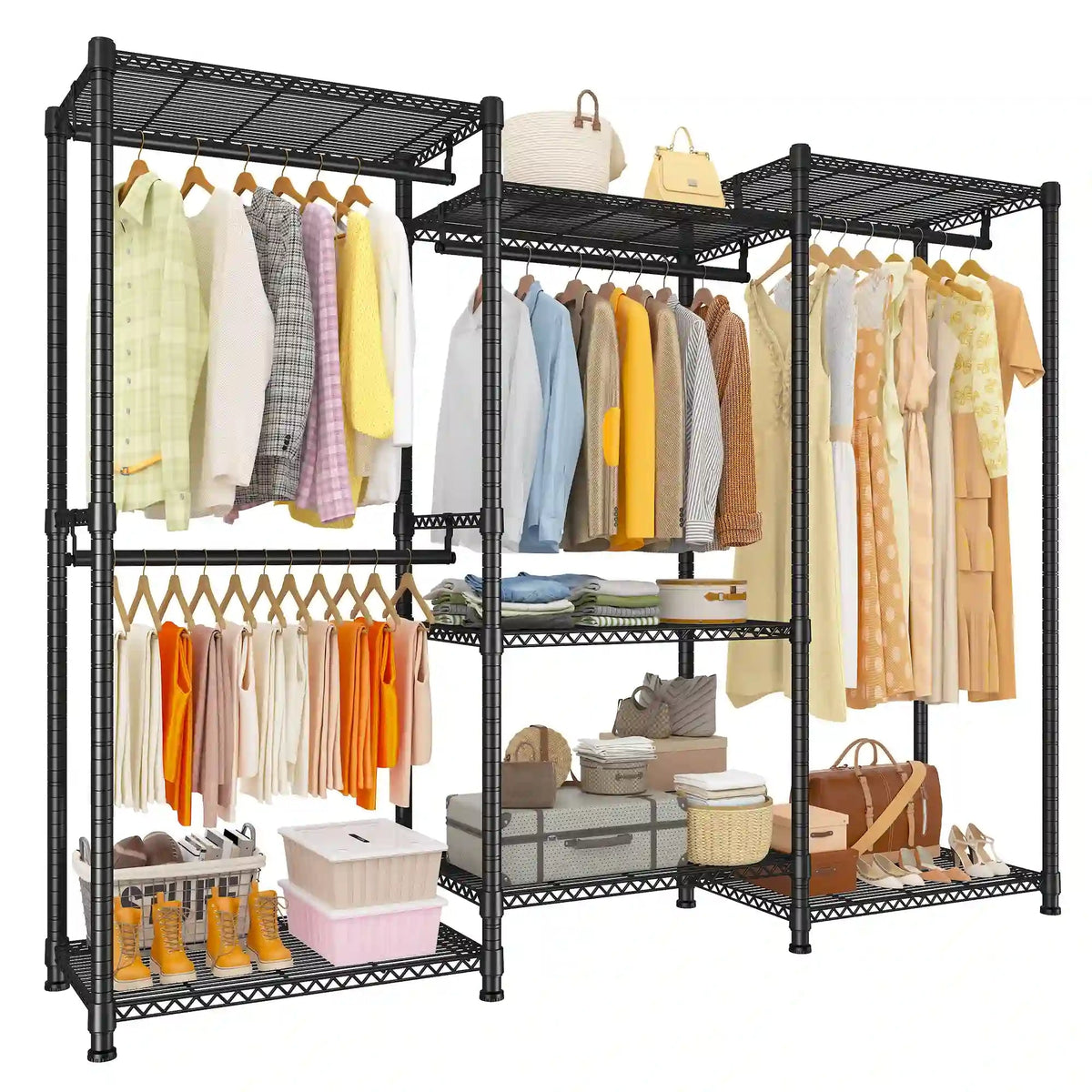 Black freestanding closet rack loaded with hanging shirts and dresses, shoes on the bottom shelf and storage boxes and baskets on the upper shelves