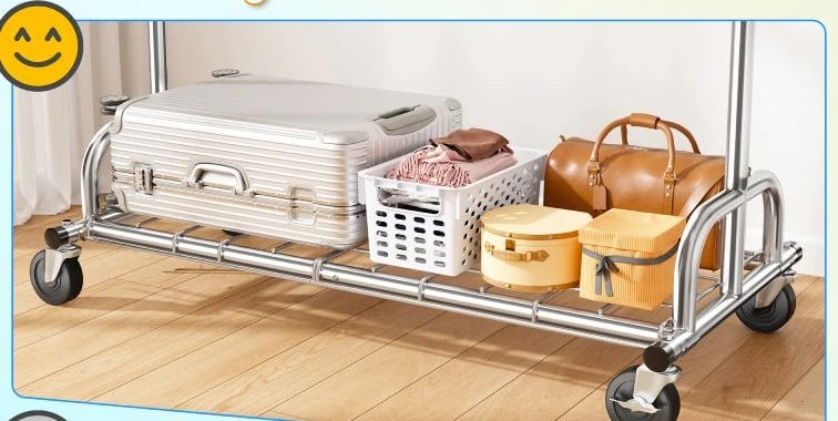 The full length reinforced wire bottom shelf holding a suitcase, a laundry basket, folded clothes, a hat box and a leather holdall