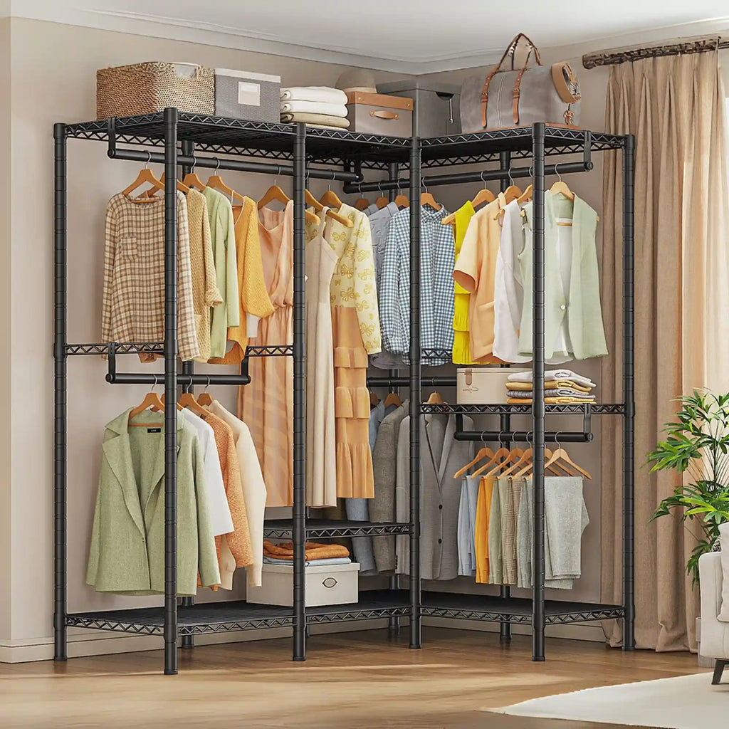 Black heavy duty clothes rack 76 x 18 x 77 in against a bedroom wall, seven rods holding shirts and dresses with folded stacks and baskets on the wire shelves
