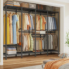 Black 76 inch clothes rack fully loaded with hanging shirts and dresses, folded towels, shoes and storage boxes across its shelves