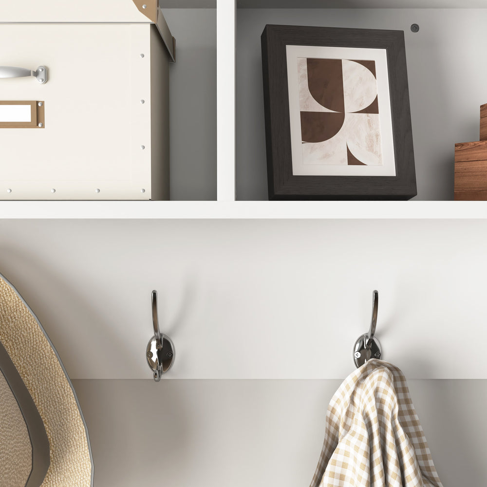 Dual hook detail on white wall mounted coat rack, view 3