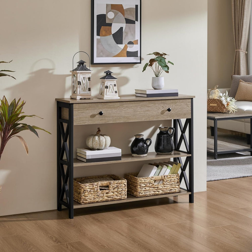 Gray 3 tier console table with drawer and baskets in a living room