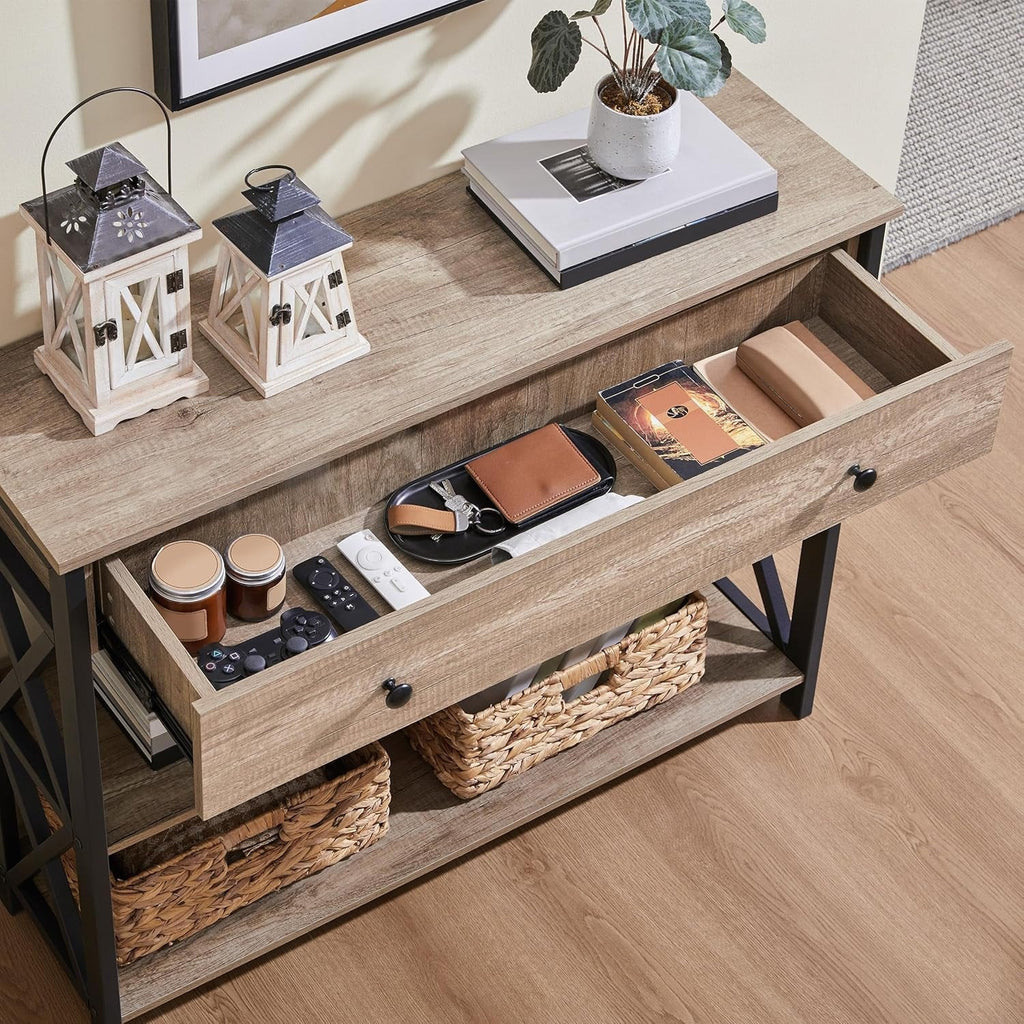 Open drawer view showing the full width storage tray of the gray console table