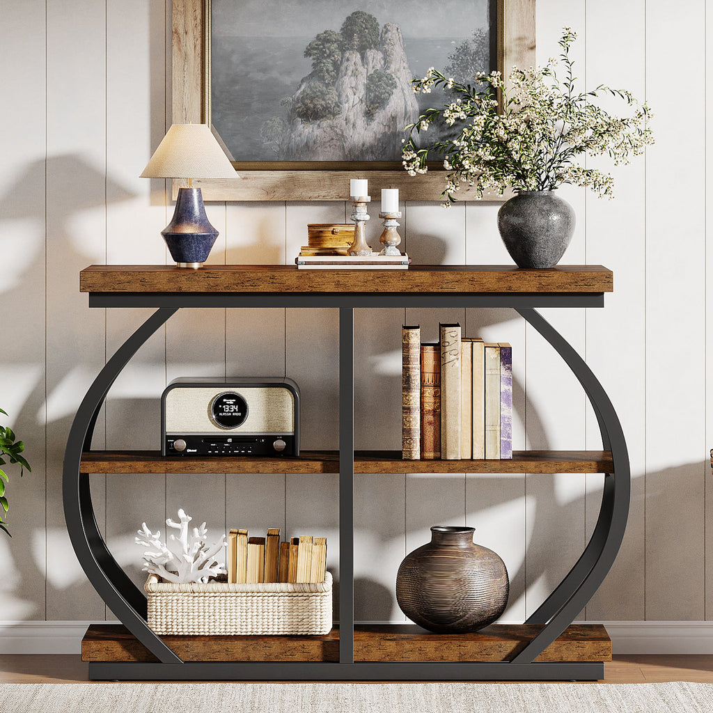 The console against a panelled wall holding a radio, books and a ceramic vase