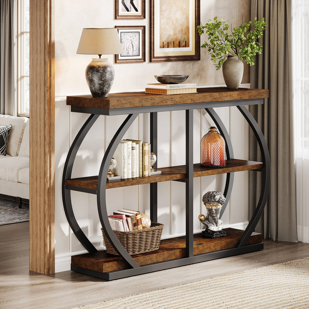 Console table in a living room with books and baskets stored on the middle tier