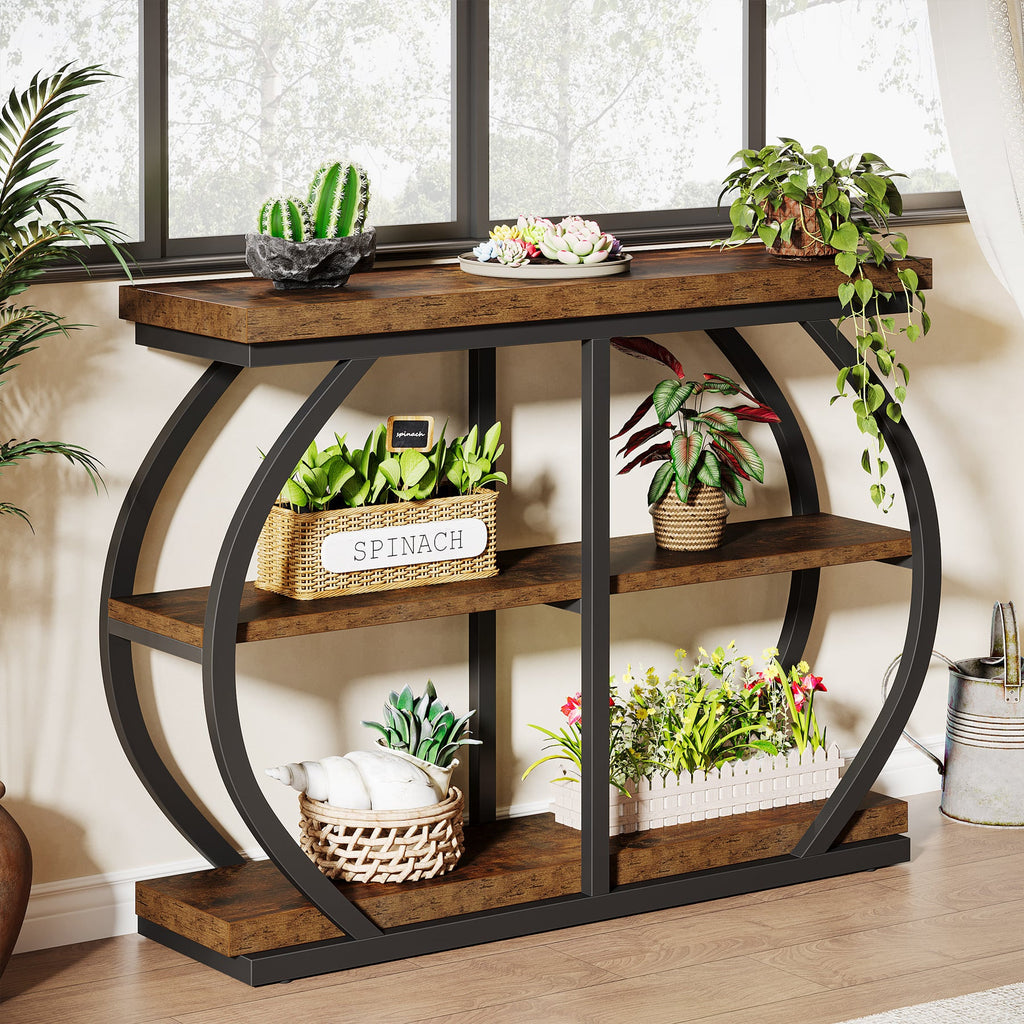 The open arched frame seen from the side with plants on all three levels