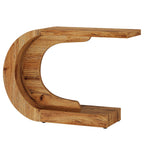 Angled view showing the single continuous curve from tabletop to base arm