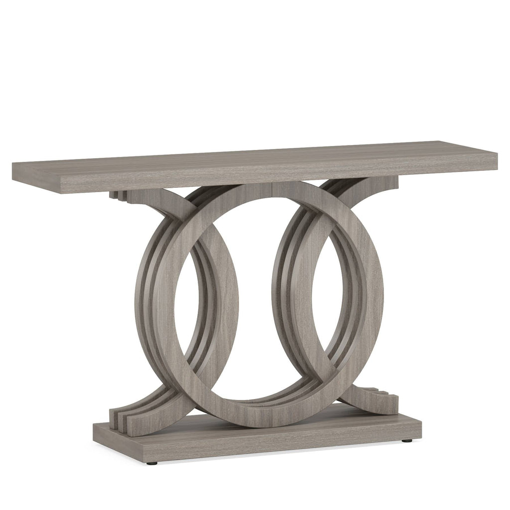 Angled view of the long gray console showing the ring base and the overhanging ends