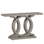 Angled view of the long gray console showing the ring base and the overhanging ends
