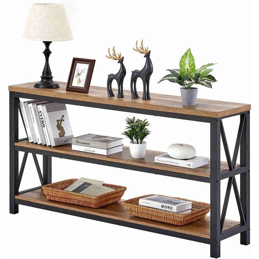 Rustic console table styled with plants, books and baskets