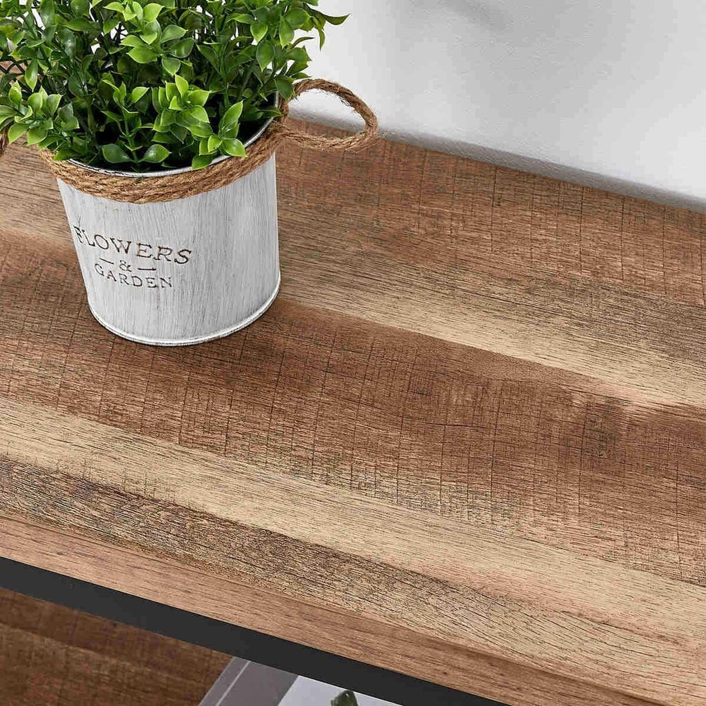Wood grain detail of the rustic oak tabletop