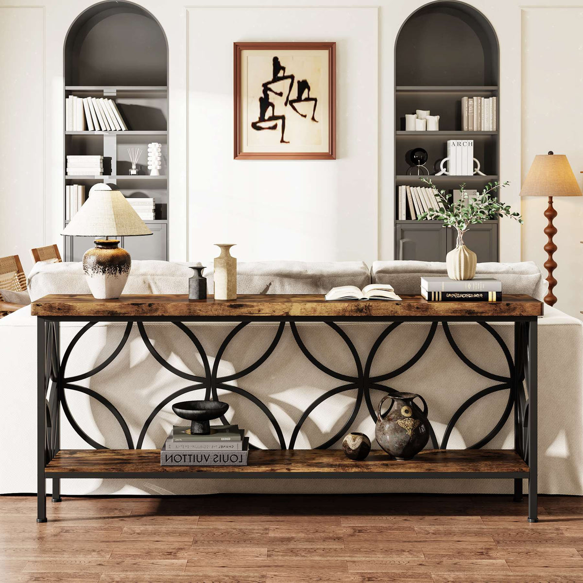 Extra long 2 tier table against a gallery wall with baskets on the lower shelf