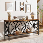 Rustic brown console table with decor beside framed prints