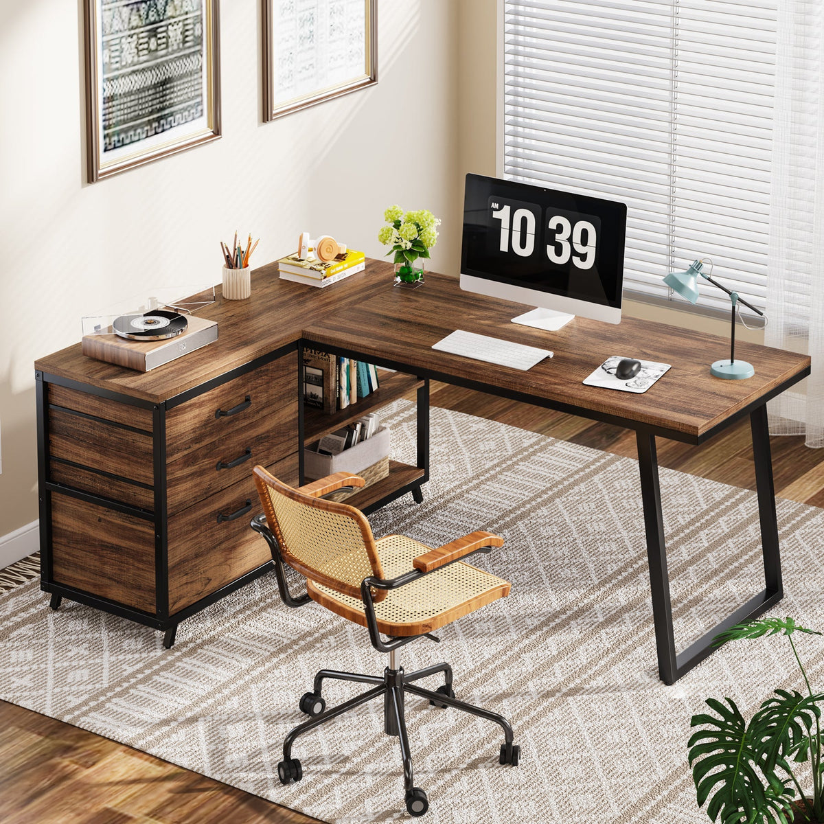 Corner desk setup with a rattan chair and monitor in a bright room