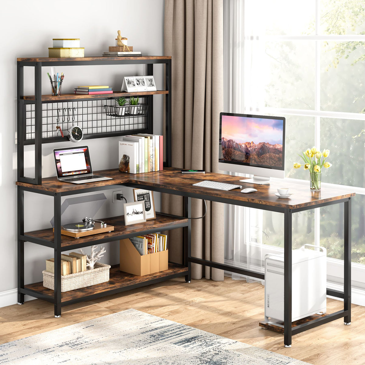 Brown L shaped desk with a hutch and mesh panel holding a monitor, books and plants
