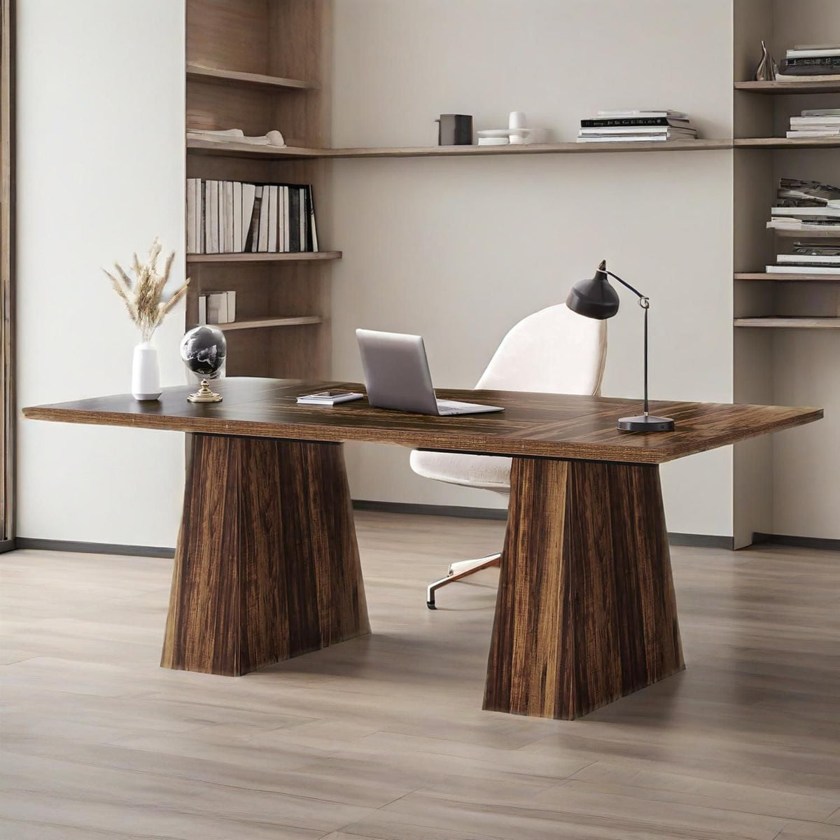 63 inch executive desk in front of built-in shelves with a laptop, globe and vase