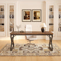 Stowena 63 inch executive desk in vintage brown with black triangle legs in a home office with bookcases