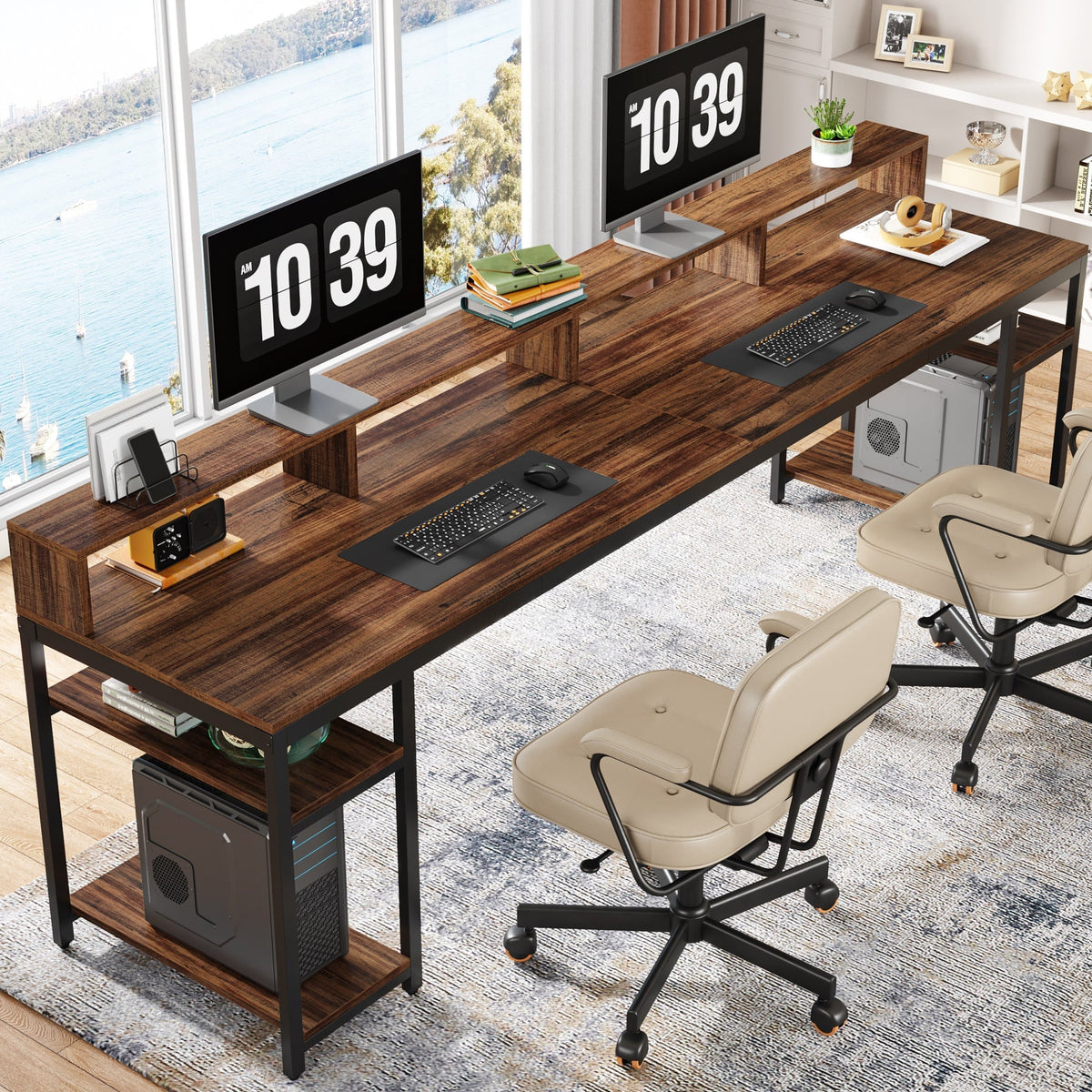 Rustic brown two person desk with two monitors raised on the full length riser and two chairs
