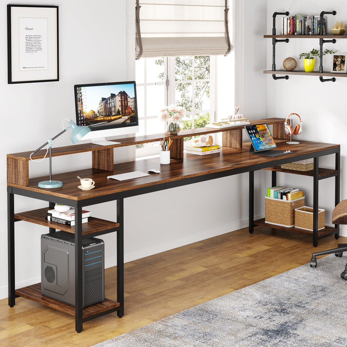 One end of the desk in use with a desktop tower on the lower open shelf
