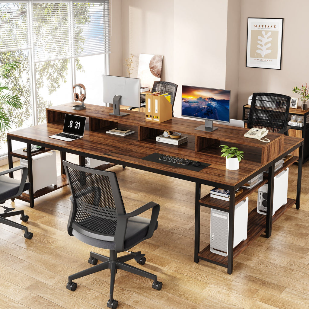 Two person desk against a wall with both stations occupied in a home office