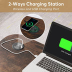 Close view of the wireless charging pad in the desk surface with a phone charging on it