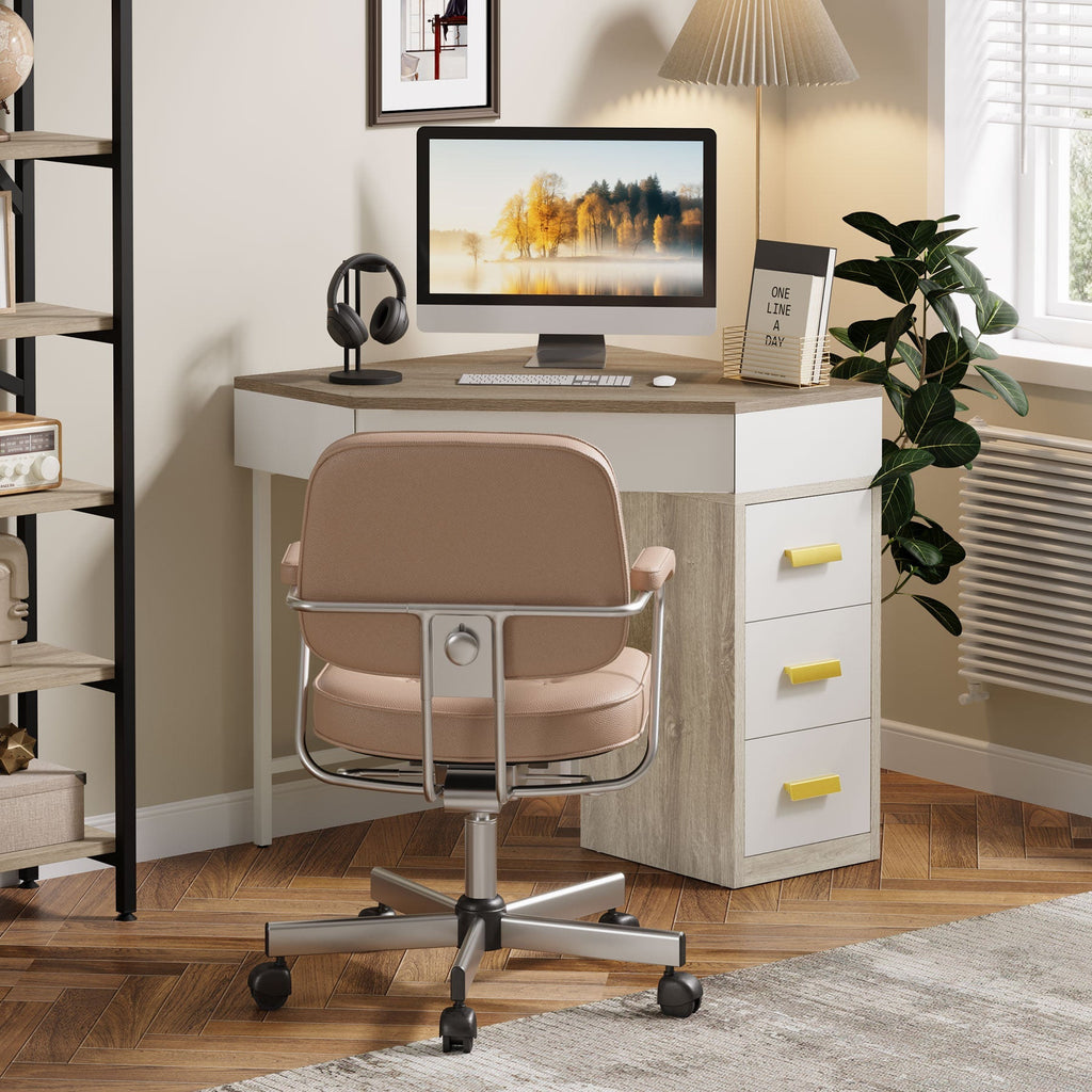 Gray and white corner desk with a monitor and headphones in a home office
