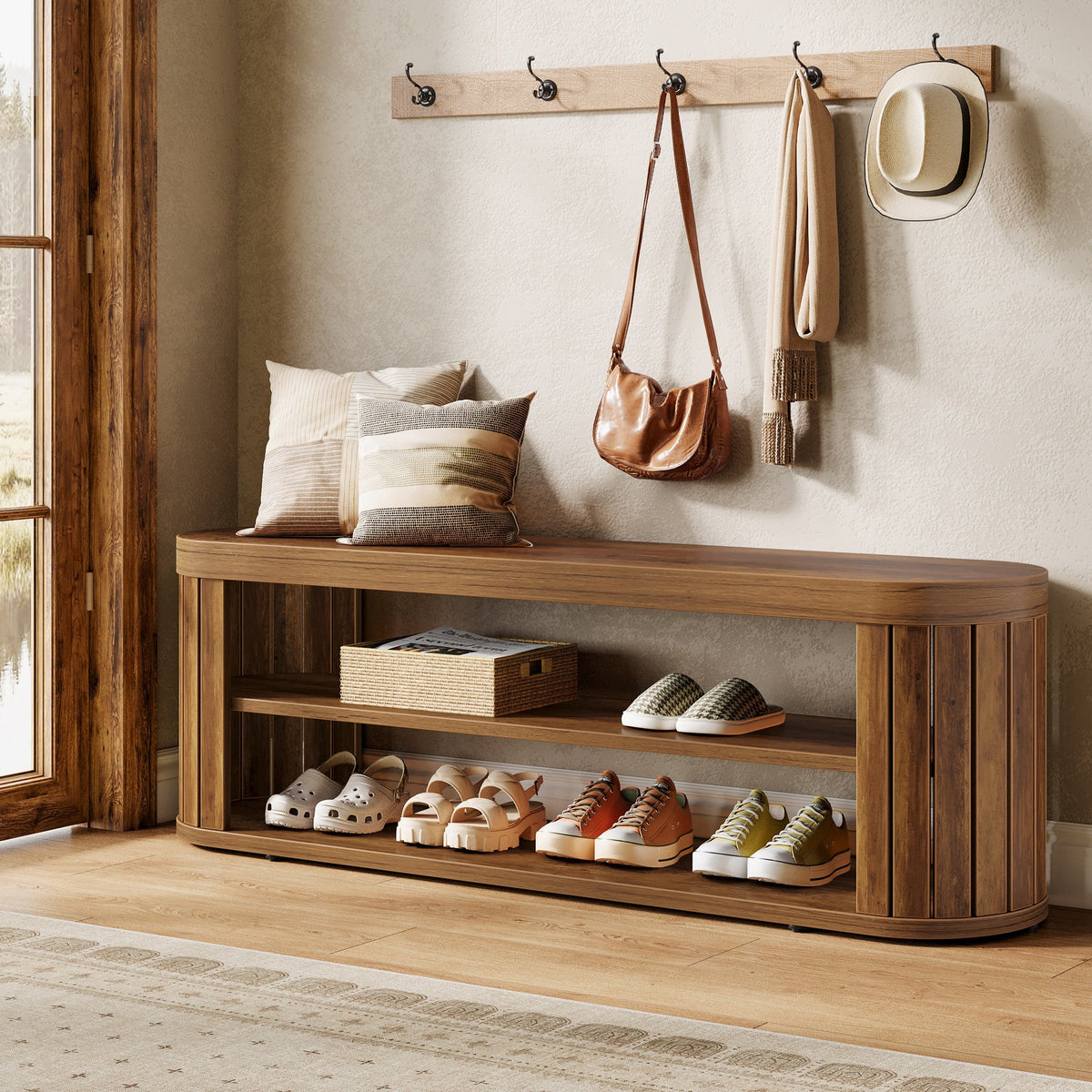 Stowena 47.2 inch entryway shoe bench in brown with pillows on the seat and shoes on 2 tiers