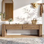 Storage bench in a hallway under a mirror with a bag on top
