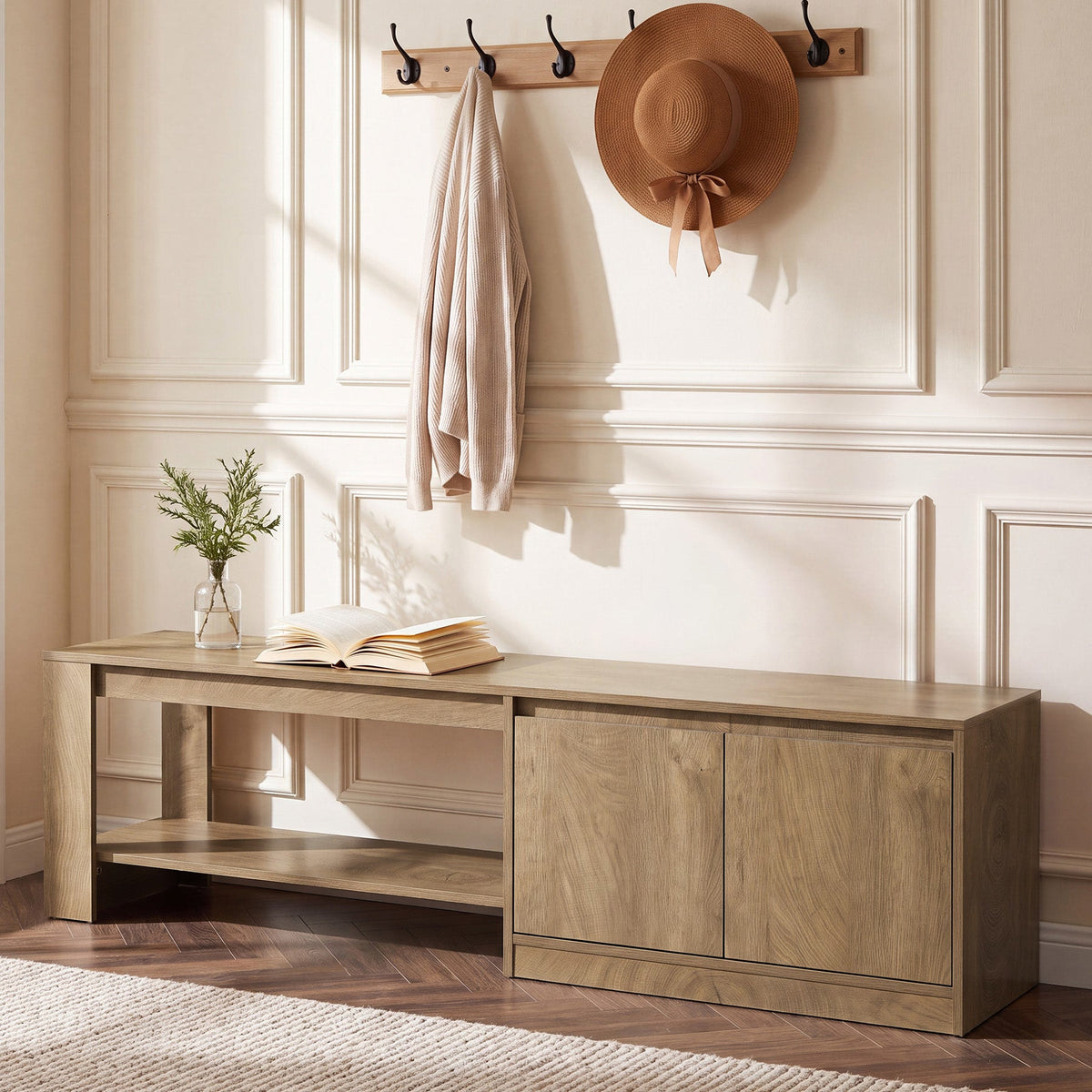 Stowena 63 inch shoe bench with cabinet under a coat rack in a panelled entry