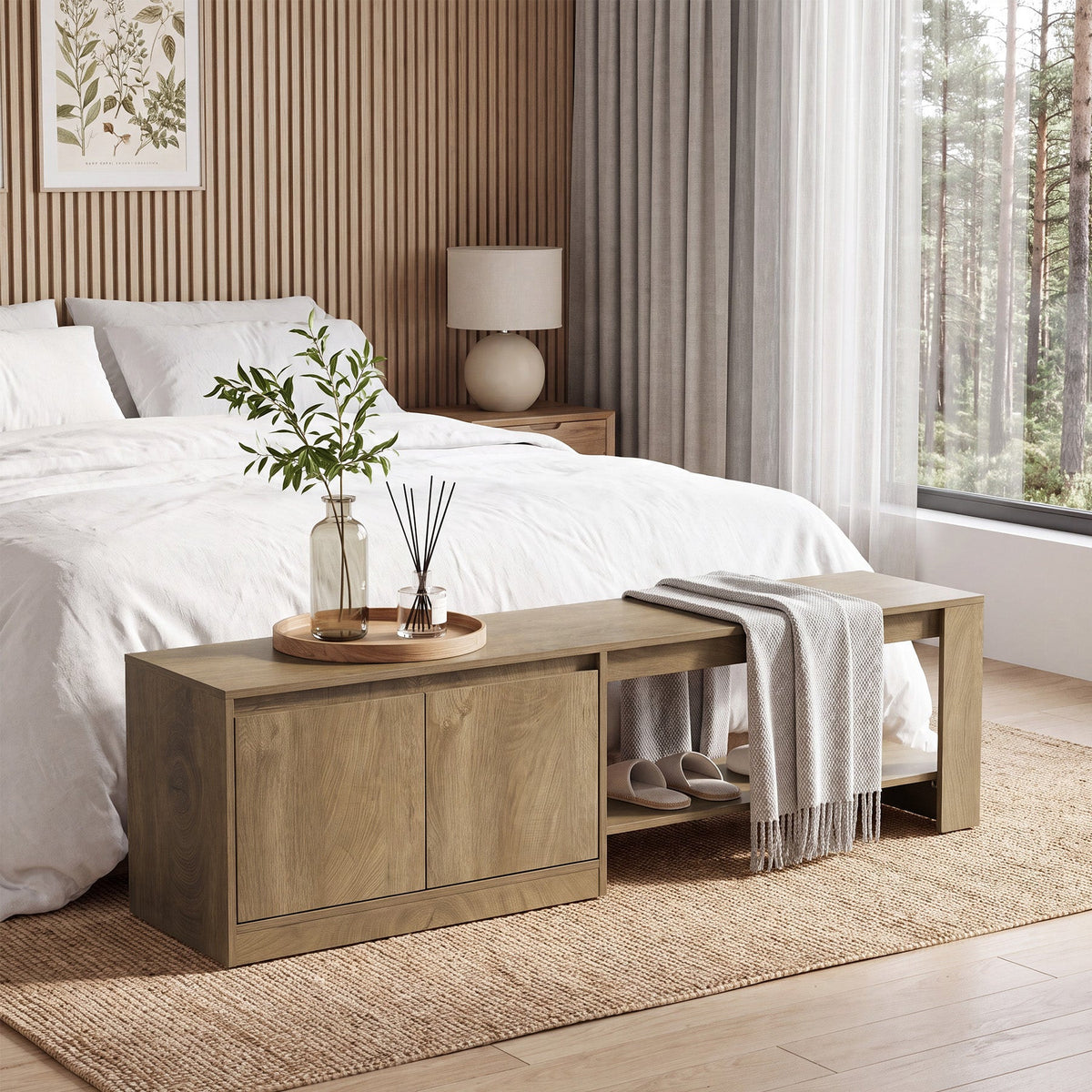 Bench at the foot of a bed with a tray and throw on the seat