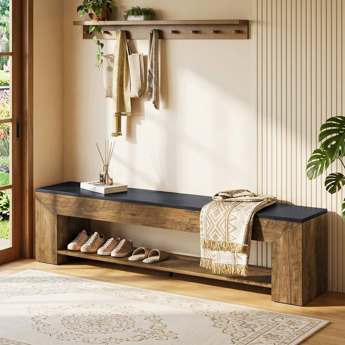 Stowena 71 inch entryway bench with black top and shoe shelf under a coat rack with hanging clothes