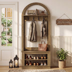 Hall tree styled with coats, bags and a radio on the top shelf beside a Welcome sign